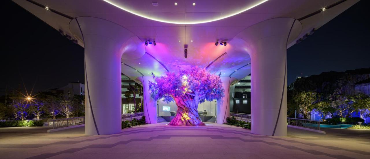 Grande Centre Point Space Pattaya Exterior photo The Tree of Life at the entrance of the hotel